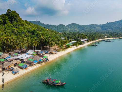 Myanmar,ÔøΩMerguiÔøΩorÔøΩMyeikÔøΩArchipelago, Moken, sea Gypsy village on sandy beach, aerial view photo