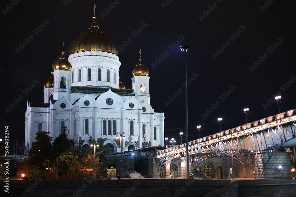 Panorama of the night city with neon lights. Cathedral of Christ the Savior at night