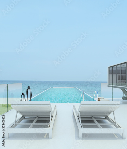 Sea view swimming pool in modern loft design,Luxury ocean Beach house, 3d rendering © eak8dda