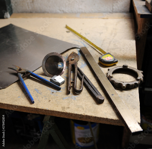 Bilde på lerret Tools of the tinsmith working in his workshop