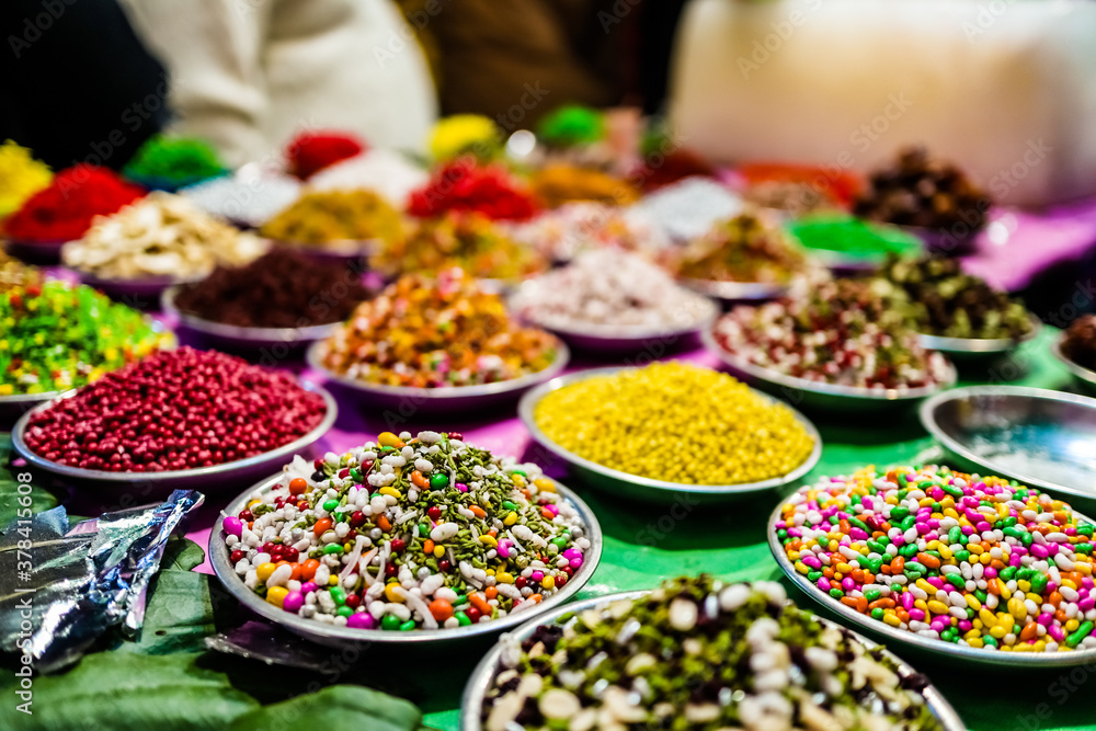 different types of colorful garnish pan masala used to decorate betel leaf banarasi paan