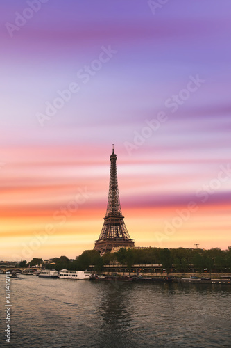 Sunset over the the Eiffel Tower and the Seine River in Paris, France.