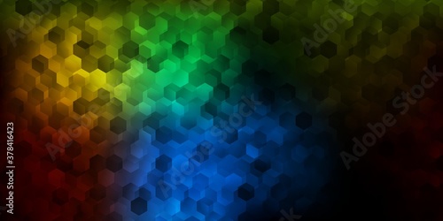 Dark multicolor vector background with hexagonal shapes.