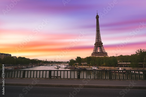 Sunset over the the Eiffel Tower and the Seine River in Paris, France.