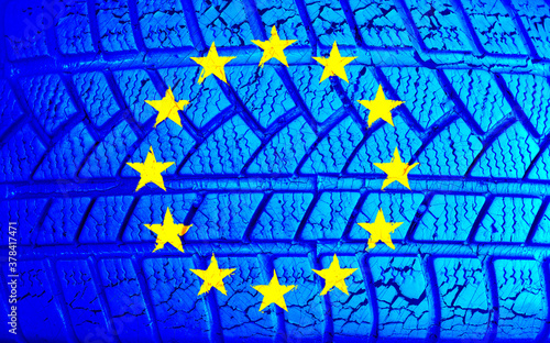 EU flag on texture background. Background for greeting cards for EU public holidays. Europe Day is celebrated on May 9. Day of the Schumann Declaration is celebrated on May 5. photo