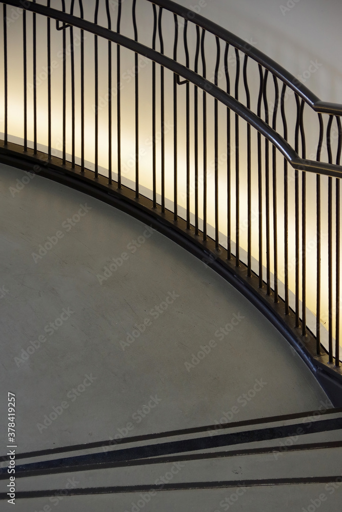 Fototapeta premium Sectional view of the stairwell railings in a large open building