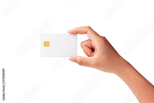 Closeup of female hand holding plastic credit card, blank white credit chip card isolated on white background.Template of blank credit card for your design, File with clipping path so easy to work. photo