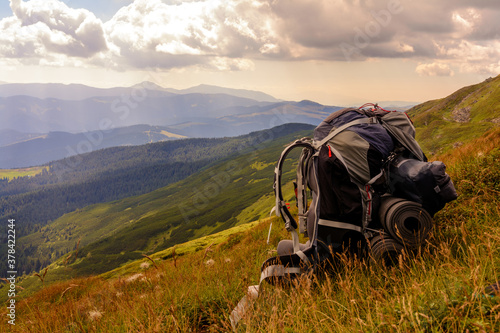 Backpack, the main element or thing in the campaign, a backpack on the background of the Carpathian mountains, the Carpathians of Ukraine. photo