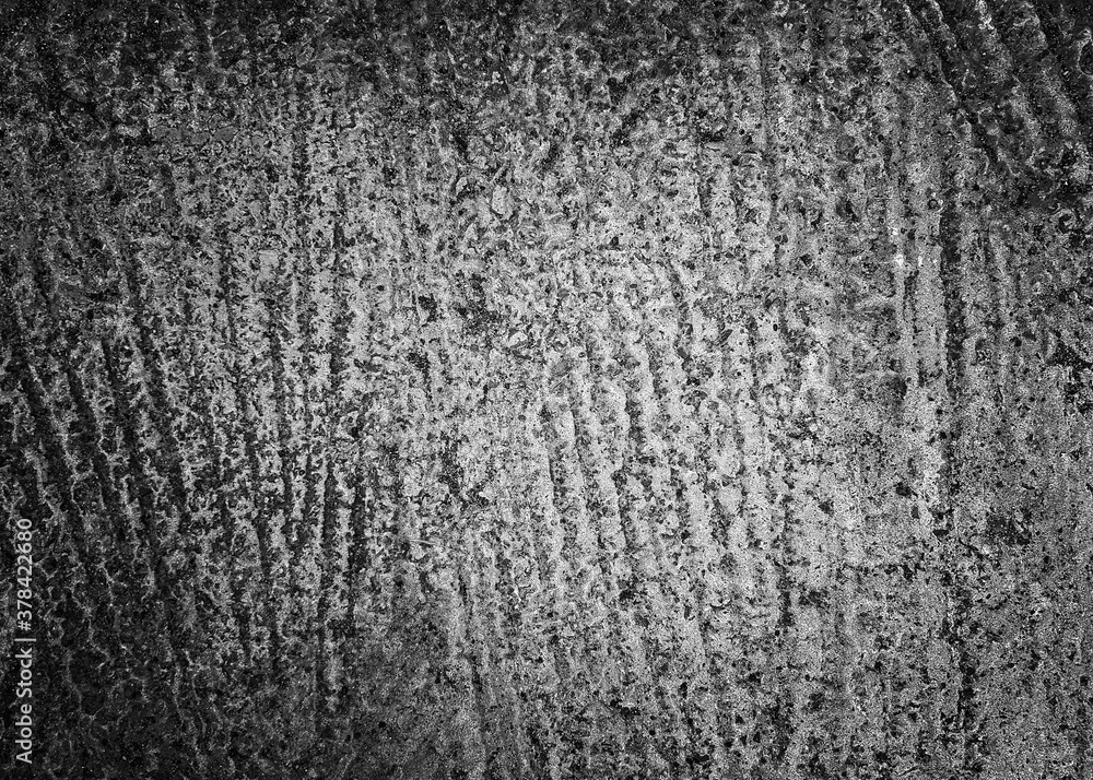 Obraz premium black and white rough cement wall texture with cracks, a background pattern