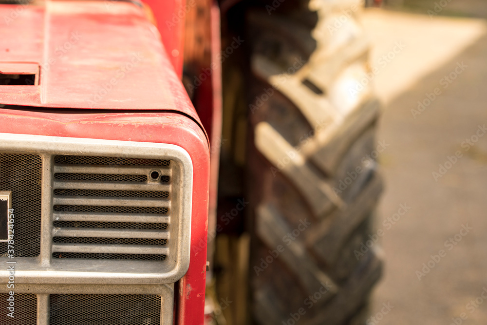 Old red seed tractor from the front