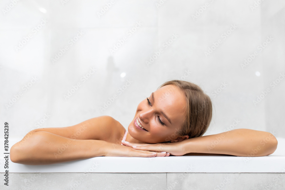 Portrait of smiling of happy beautiful woman clean fresh healthy white skin enjoy relaxing taking shower and bath with in bathtub at the bathroom Portrait of smiling of happy beautiful woman clean fresh healthy white skin enjoy relaxing taking shower and bath with in bathtub at the bathroom