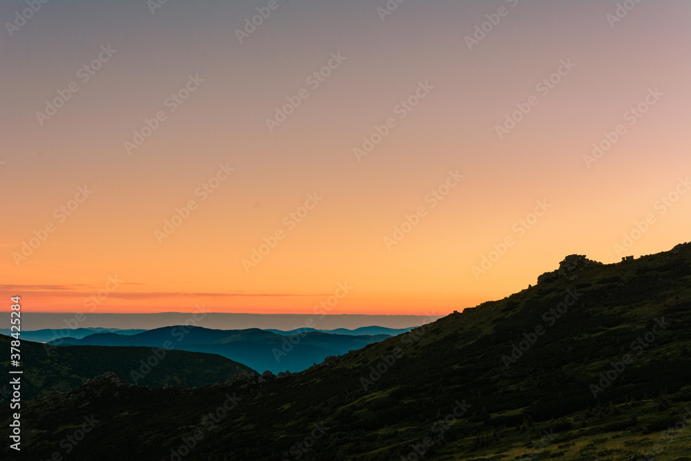 Picturesque landscapes of the Carpathians, before sunrise there is a light fog, sunrise in Montenegro.
