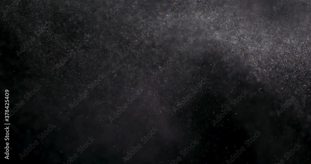 White dust powder isolated on black background White dust powder isolated on black background
