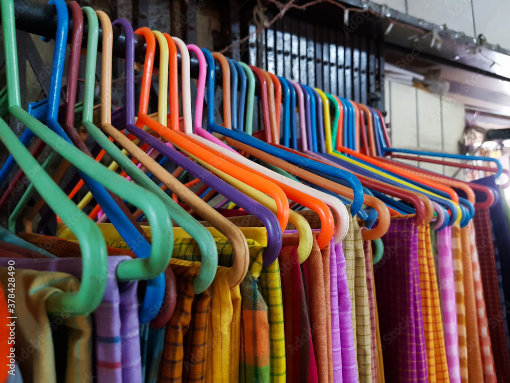 different coloured sarees on hangar for sale different coloured sarees on hangar for sale