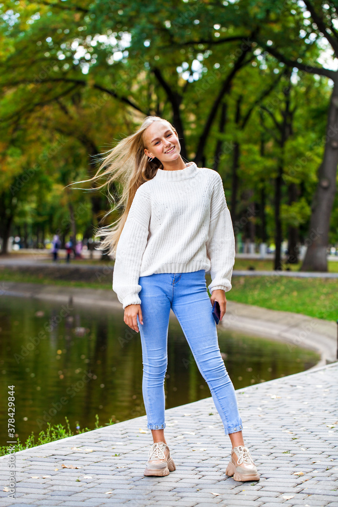 Portrait of a young beautiful blonde girl