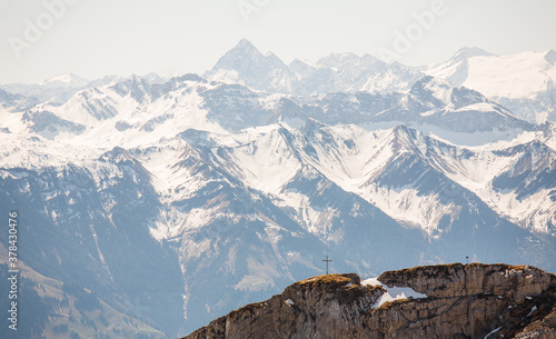 Cross on top of a mountain near Lucerne, Switzerland.