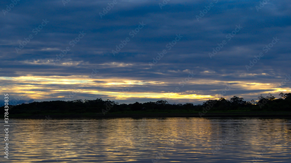 Sunset on the Amazon River in Peru