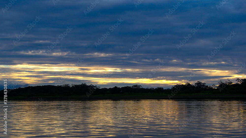 Sunset on the Amazon River in Peru Sunset on the Amazon River in Peru