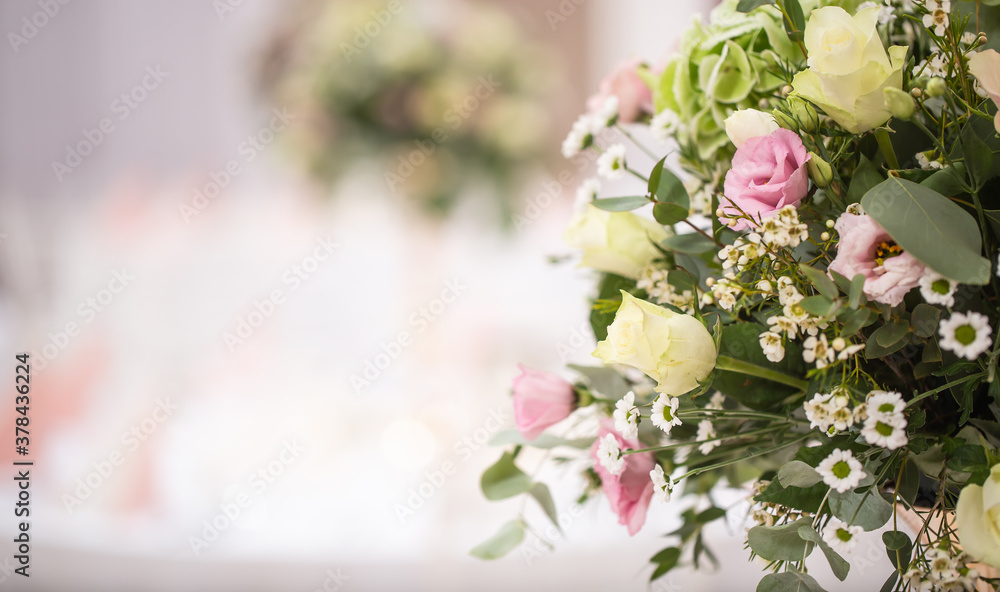 Detail of a wedding flower bouquet with pink roses situated in the right side of the picture Detail of a wedding flower bouquet with pink roses situated in the right side of the picture