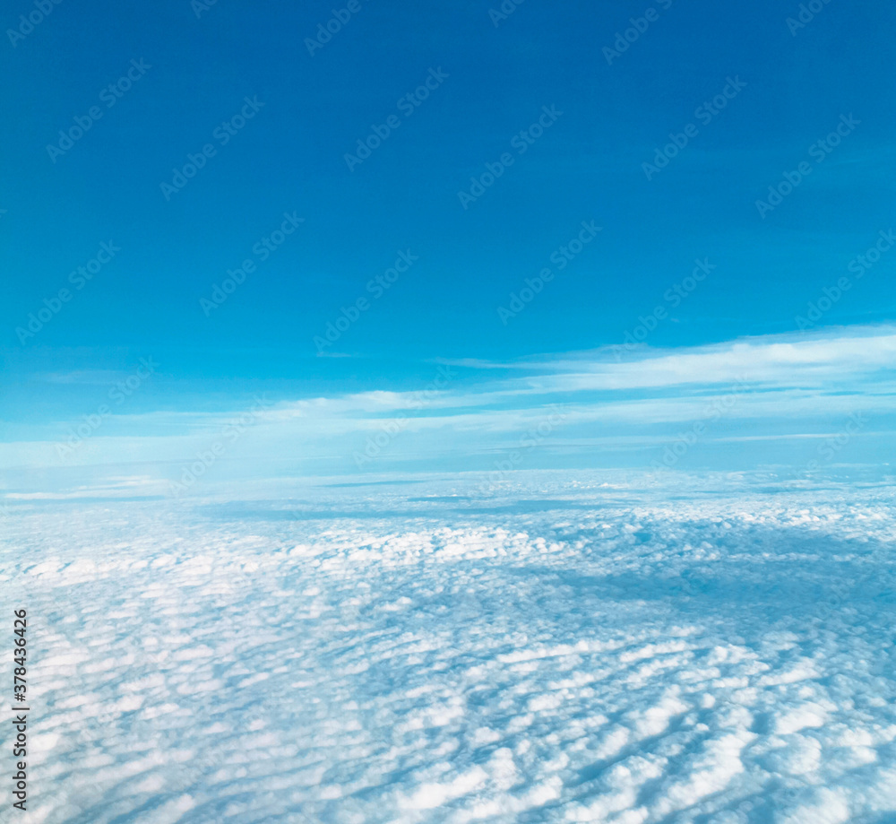 Clouds seen through an airplane window
