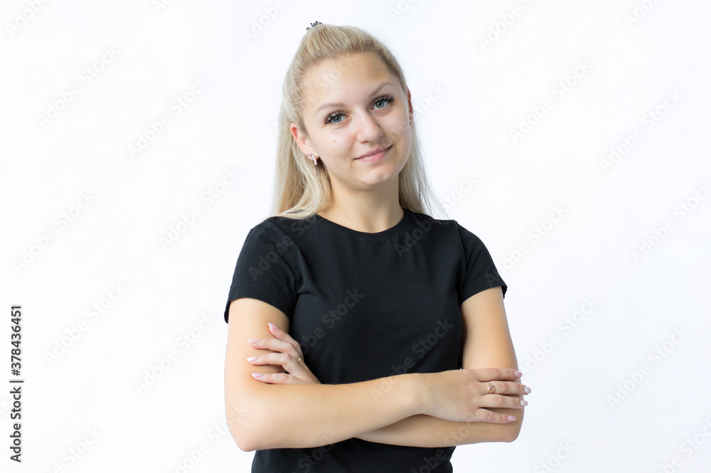portrait of a girl with fair hair, looking with satisfaction at camera, being happy. Beautiful woman isolated against blank studio wall. portrait of a girl with fair hair, looking with satisfaction at camera, being happy. Beautiful woman isolated against blank studio wall.