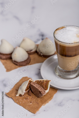 Coffee with milk and Dulce de Leche cones with sweet chocolate cones