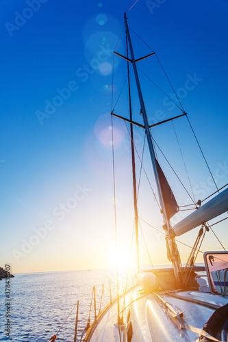 Yacht Sailing against sunset. Sailboat. Travel Concept © Max Topchii