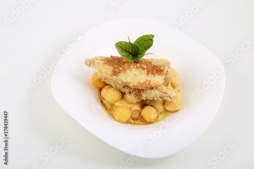 fish fillet with potatoes and sauce