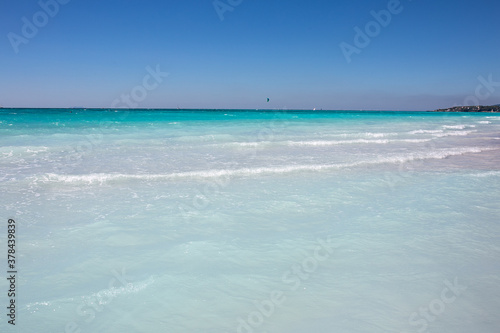 Sandy beach near Tuscany, blue sea © melnyksergey