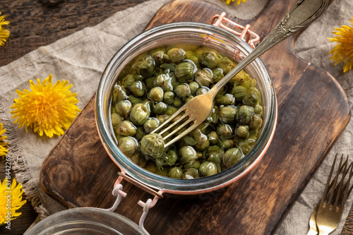 Photos False capers made from young dandelion buds