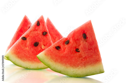 Watermelon slices on white isolated background
