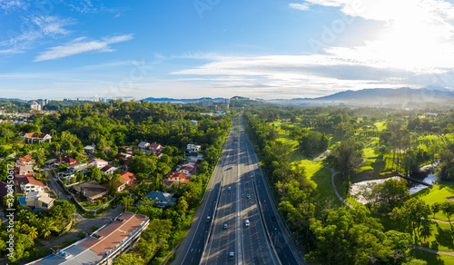 Beautiful Panorama Aerial image of car moving on Kota Kinabalu City, Sabah, Malaysia during Morning