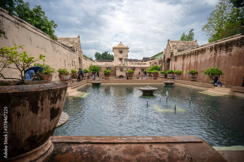 Taman Sari Water Castle is the site of a former royal garden of the Sultanate of Yogyakarta. It is located about 2 km south within the grounds of the Kraton, Yogyakarta, Indonesia. photo