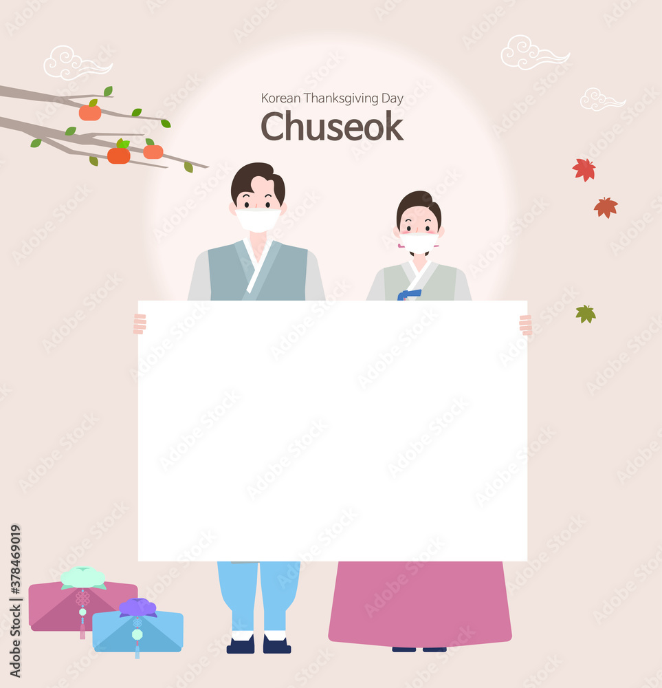 A man and woman couple standing wearing hanbok and masks on Chuseok. The couple is holding a board for signs A man and woman couple standing wearing hanbok and masks on Chuseok. The couple is holding a board for signs