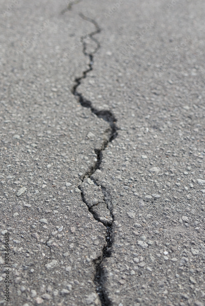 Obraz premium アスファルト ひび割れ 素材