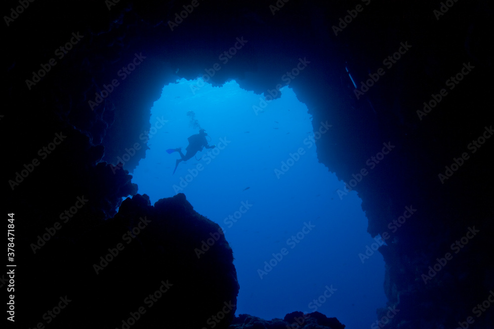 Scuba Diver in Cave, Galapagos Islands, Ecuador Scuba Diver in Cave, Galapagos Islands, Ecuador