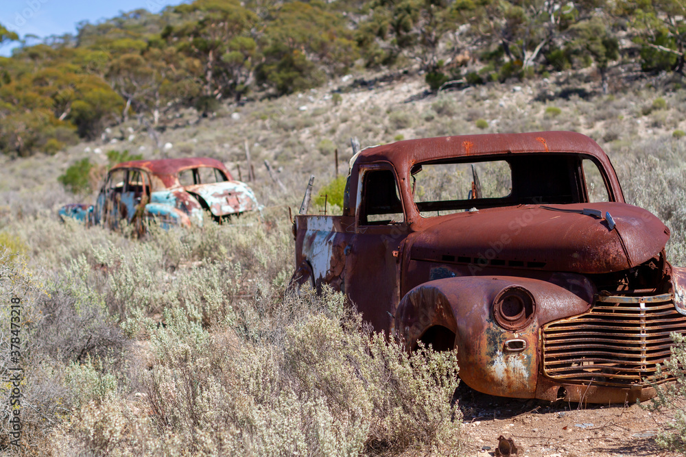 Old wrecked Oldsmobile cars in outback Australia Old wrecked Oldsmobile cars in outback Australia