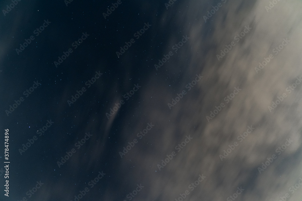 Night Sky with a Line of Hazy Clouds