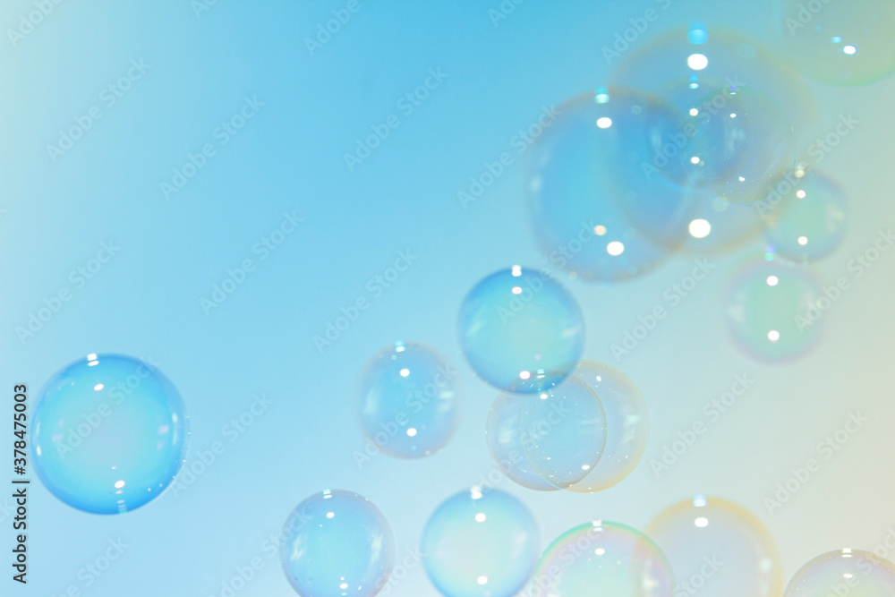 Colorfull soap bubbles float background.