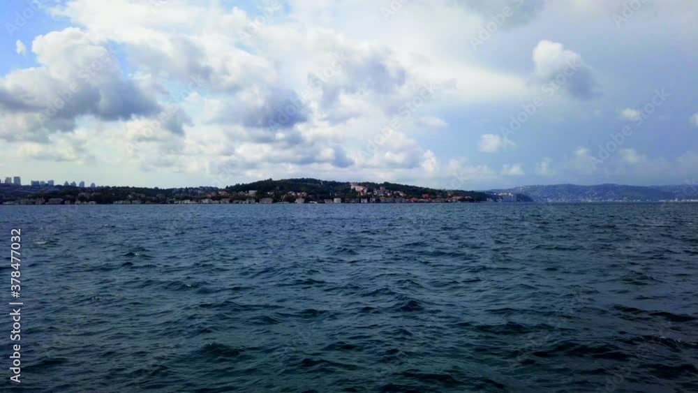 Timelapse shot of Istanbul, Bosphorus as the white clouds are passing by on a blue sky day. Timelapse shot of Istanbul, Bosphorus as the white clouds are passing by on a blue sky day.