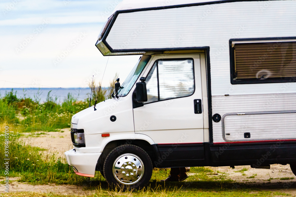 Camper car on sea shore