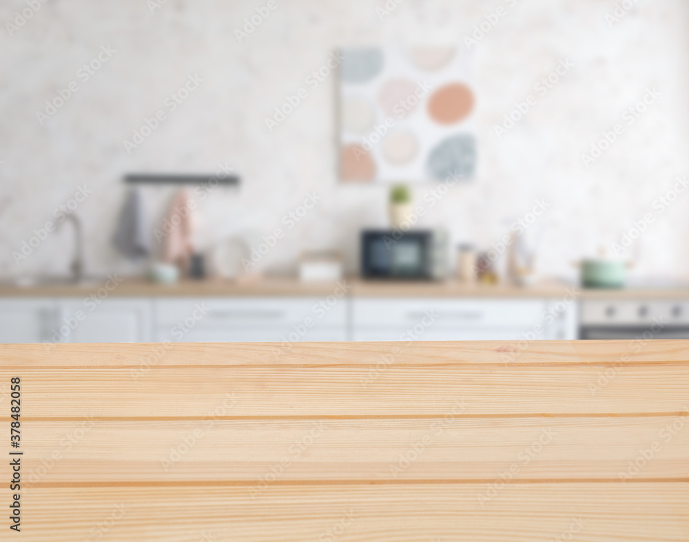 Empty wooden table in modern kitchen Empty wooden table in modern kitchen