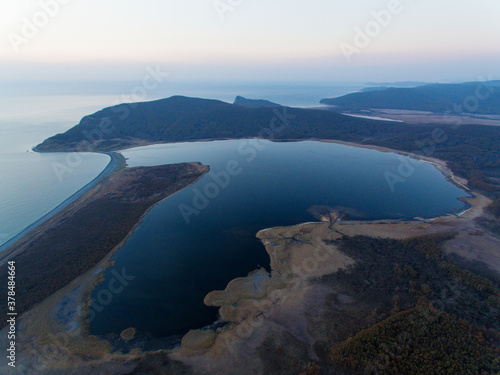 View from above. Beautiful lake Blagodatnoe in the form of a heart. Lake in the Sikhote-Alin Biosphere Reserve