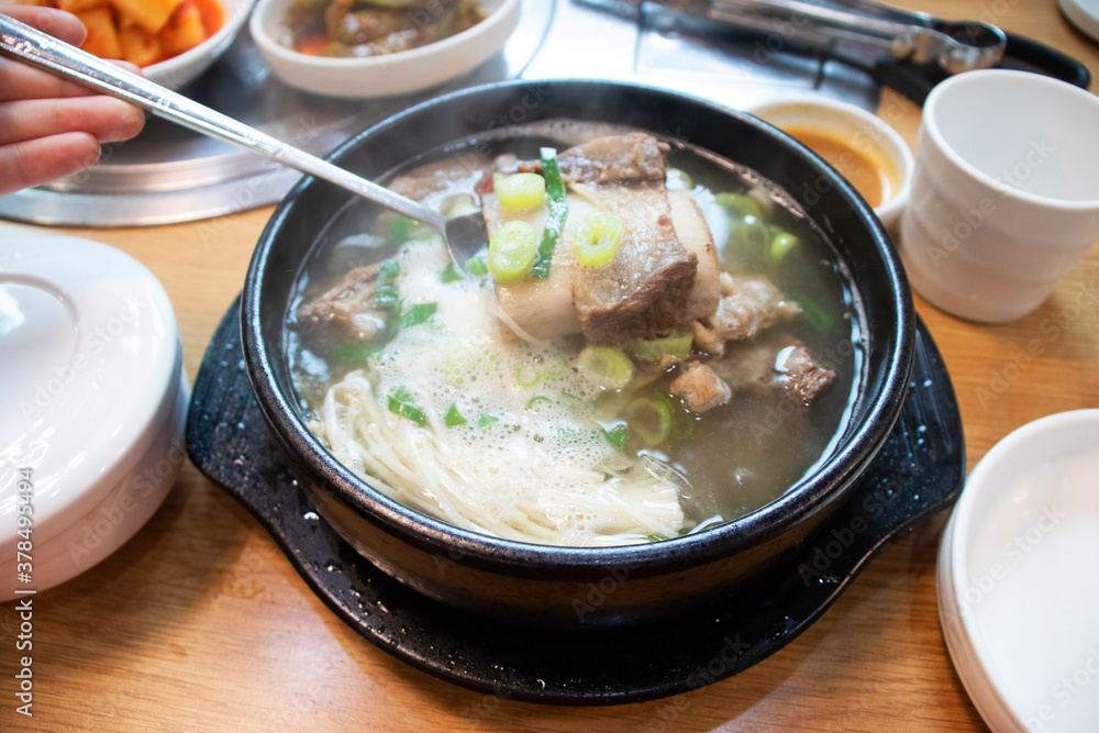 Delicious Short Rib Soup in a bowl. Korean style beef rips soup. Delicious Short Rib Soup in a bowl. Korean style beef rips soup.