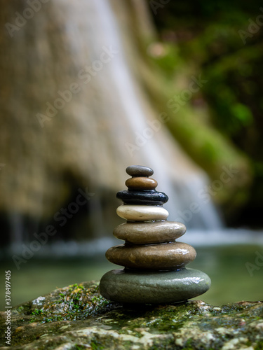 Balanced Zen stones at the waterfalls