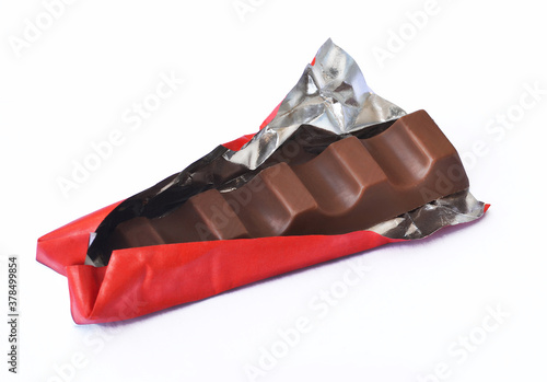 Wallpaper Mural Dark chocolate bar in red opened foil on white background. Torontodigital.ca
