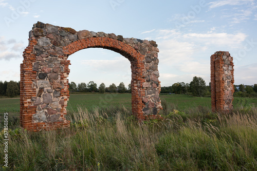 City Smiltene, Latvia.Old brick stonehenge and park. photo