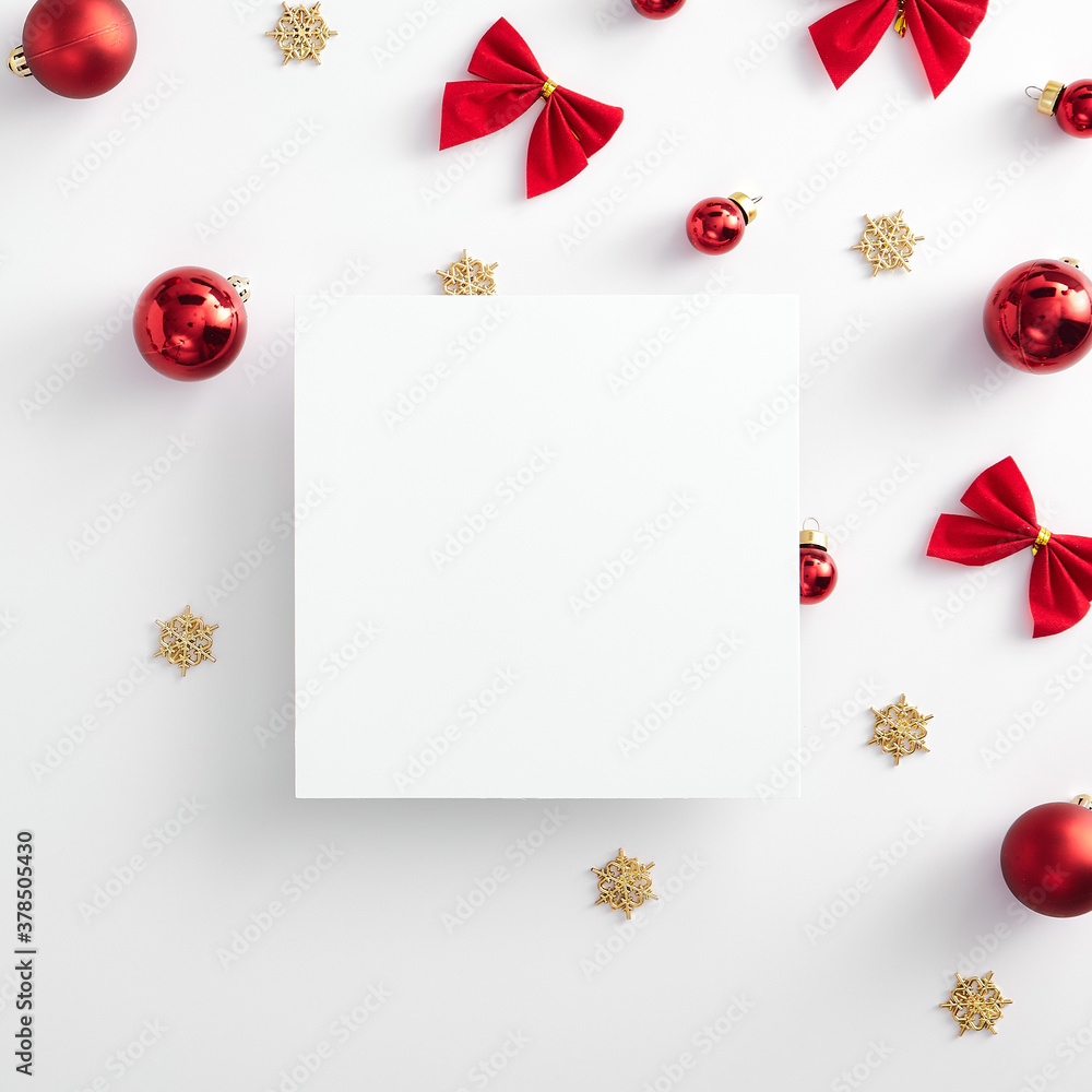 Red christmas ball and gold snowflake with empty paper blank Red christmas ball and gold snowflake with empty paper blank