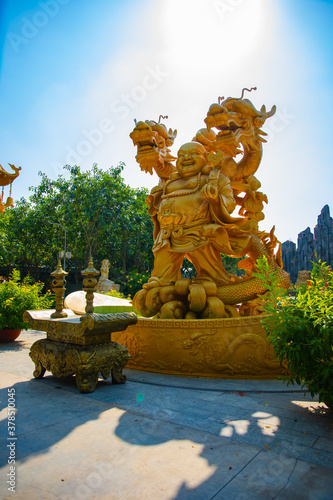 A Guardian statue at Suoi Tien park in Ho Chi Minh Vietnam photo