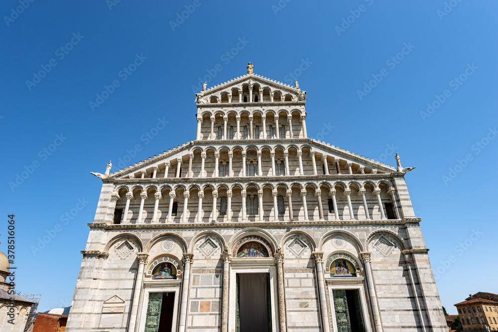 Main facade of the Pisa Cathedral, (Duomo di Santa Maria Assunta), in Pisan Romanesque style, Square of Miracles (Piazza dei Miracoli), Tuscany, Italy, Europe.